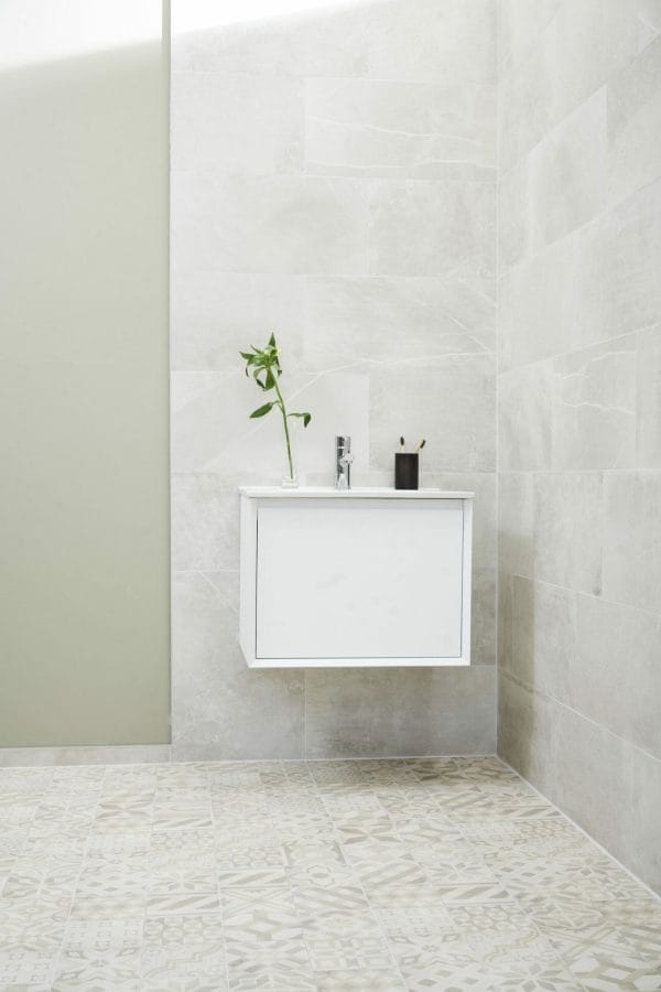 Geneva silver porcelain tiles used on the walls of a modern bathroom